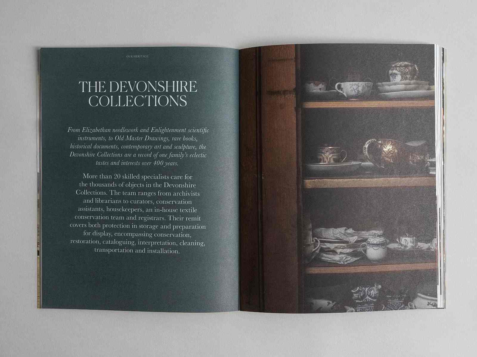 Looking inside the Chatsworth House Trust Annual Review. THE DEVONSHIRE COLLECTIONS. Traditional ceramics inside a wooden cupboard.