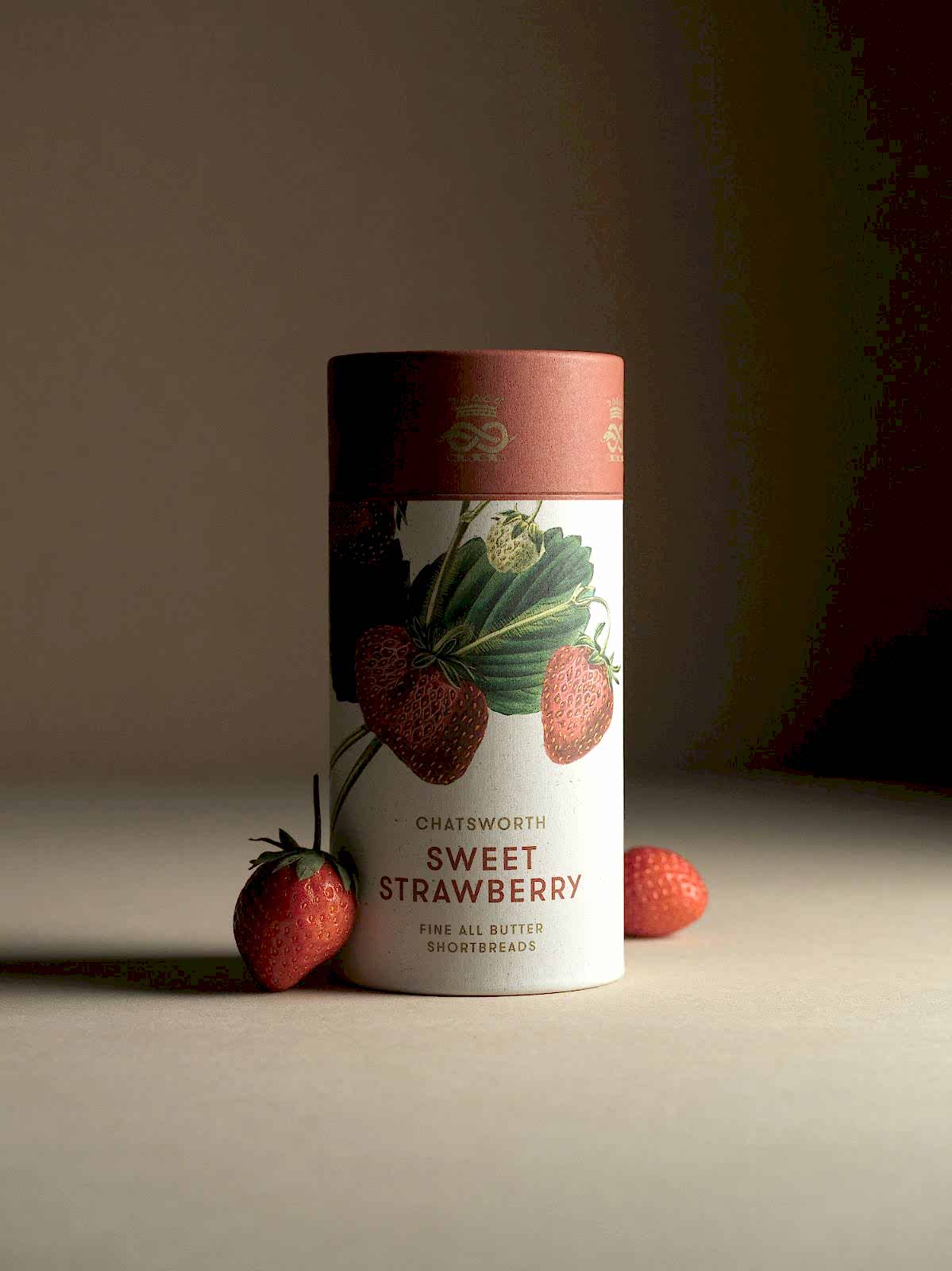 Strawberry Chatsworth Artisan Biscuits. Vertical packaging with botanical illustrations across the side.