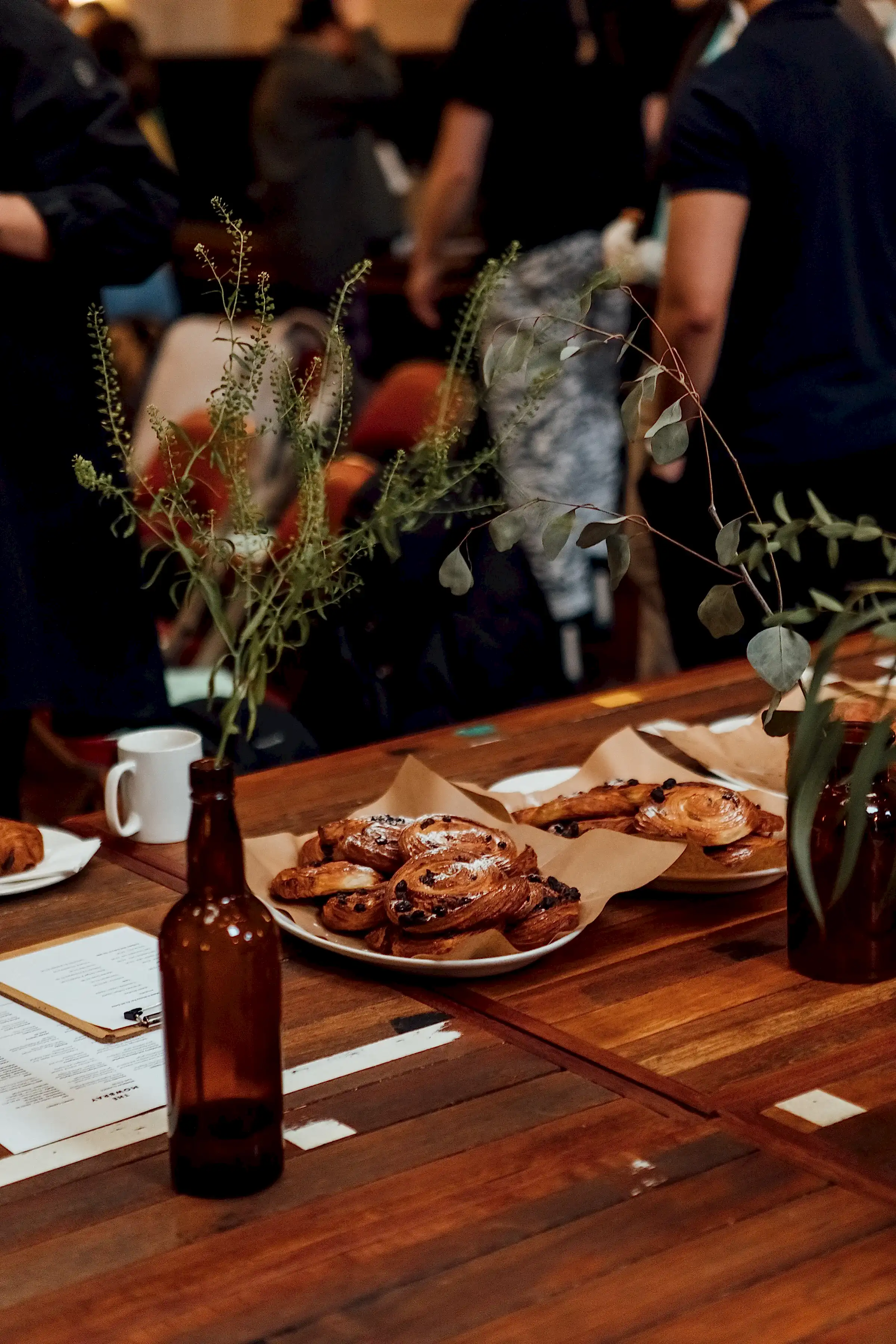 A table spread of croissants and danish pastries supplied by The Mowbray for the attendees of the event.