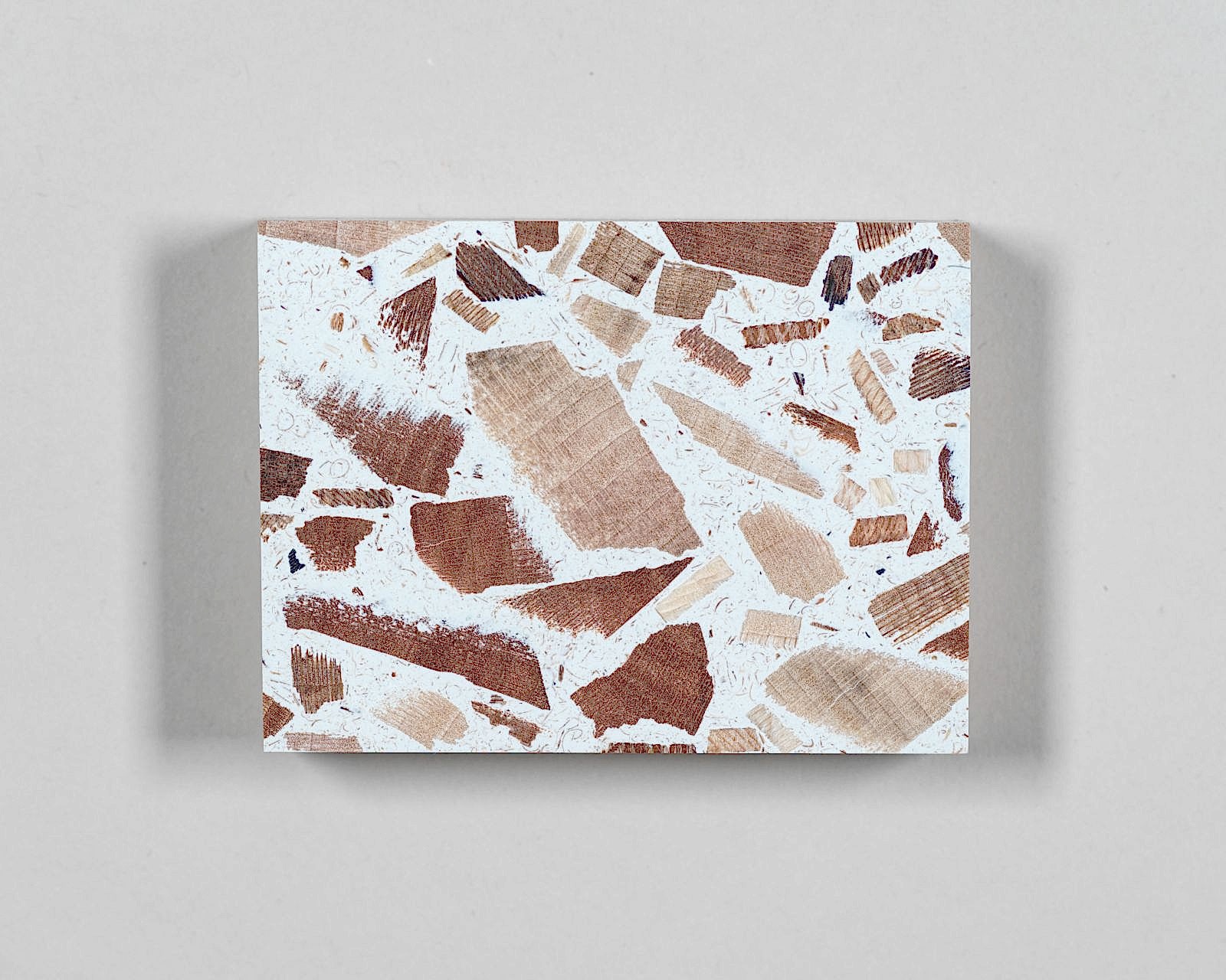 Sample of recycled wood off-cut terrazzo surface as part of 93â€™s sustainable materials library. 