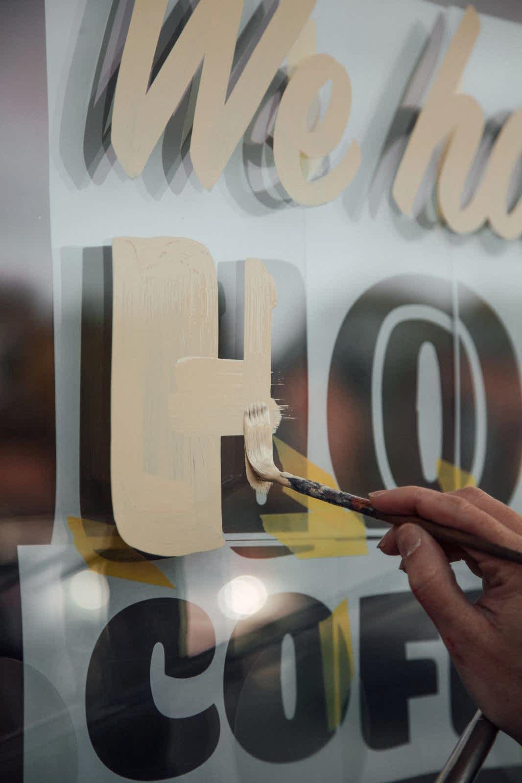 Enamel Sign Painting Shop Window